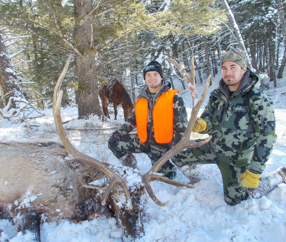 This is what happens when you and your best hunting partner finally make the Montana trip happen 🦌  Deep in the backcountry of Southwest Montana, miles from the nearest trailhead, with a pack string standing by and a bull on the ground between you. Black Otter Guide Service has been making moments 