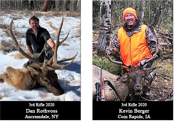 A man kneels in the snow next to a harvested elk.