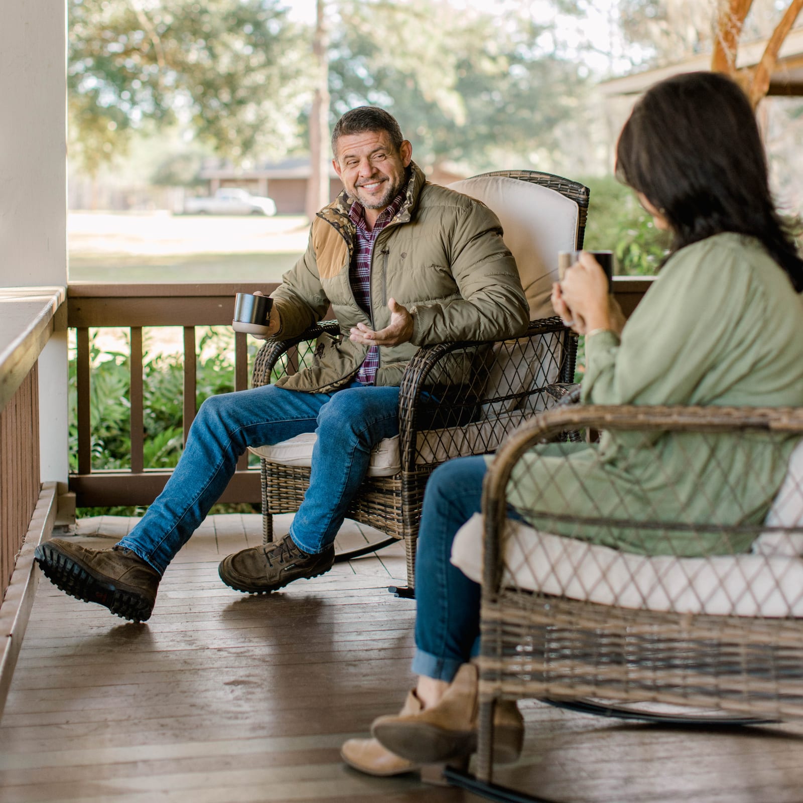Man and woman on porch at Live Oak Plantation
