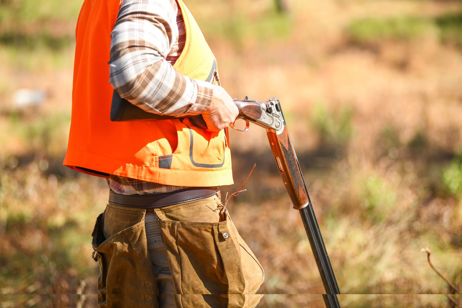 Photo of a man holding a gun at Longleaf Hill Plantation