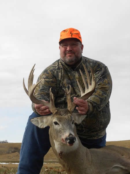 Hunter with deer