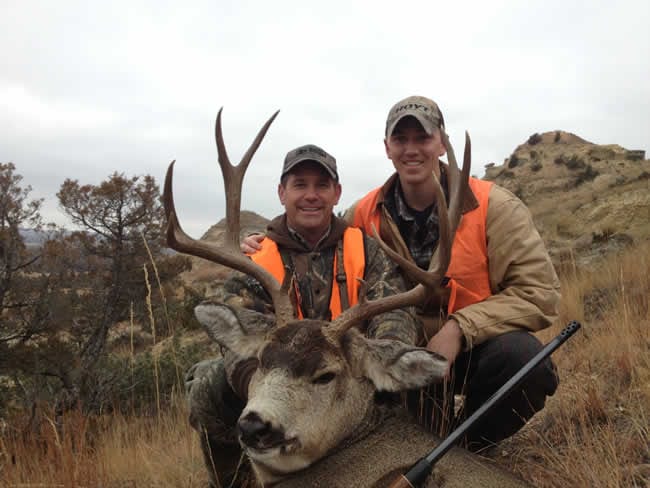 2 men on a guided deer hunt