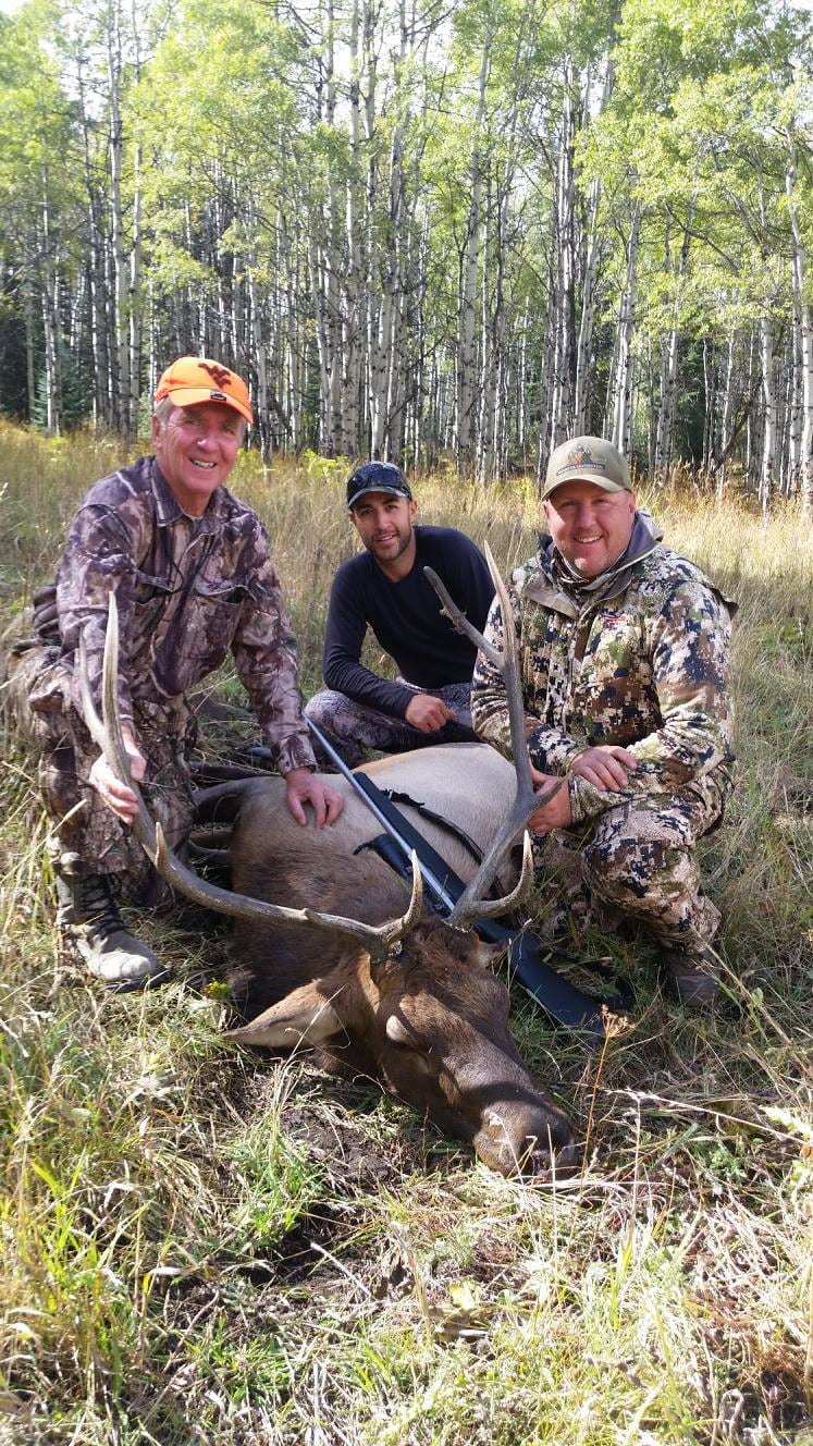 hunter and his Elk with their guides