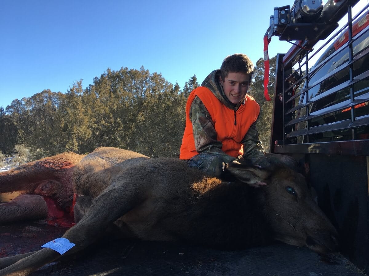 colorado bear hunter in blaze orange with trophy 3