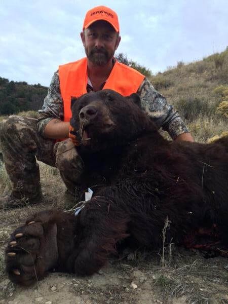 colorado antelope hunter in blaze orange with trophy 34